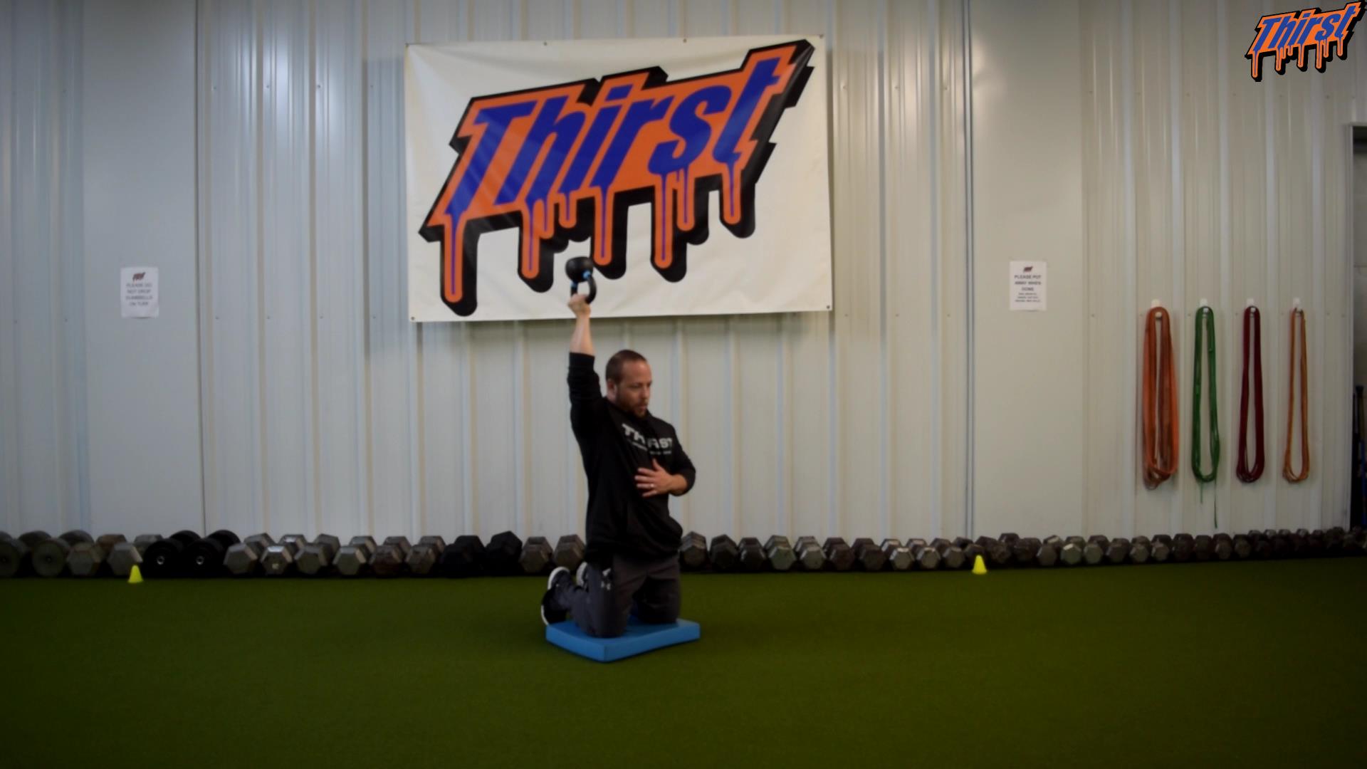 Tall Kneeling Single Arm Bottoms Up KB Overhead Press