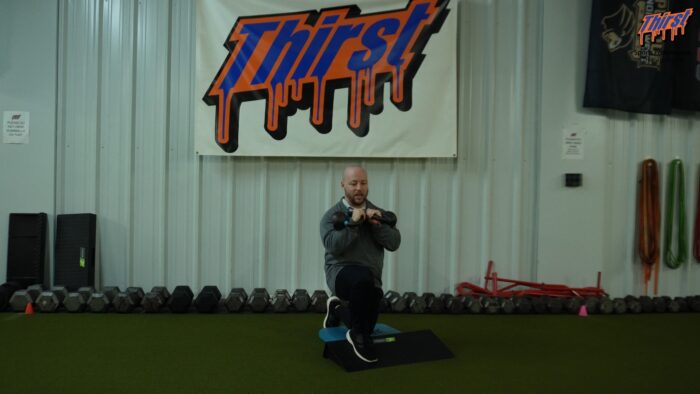 Slantboard Double KB Front Rack Reverse Lunge