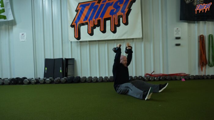 Double KB Overhead Spread Eagle Sit Up