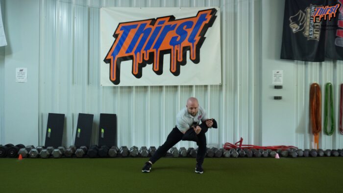 Sandbag Zercher Cross Connect Lateral Lunge