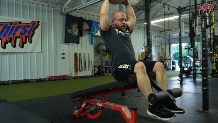 Decline Med Ball Overhead Sit Up