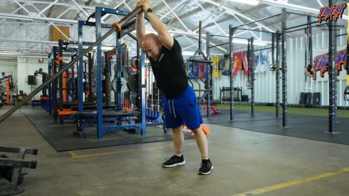 Landmine Squat To Overhead Press (Thruster)