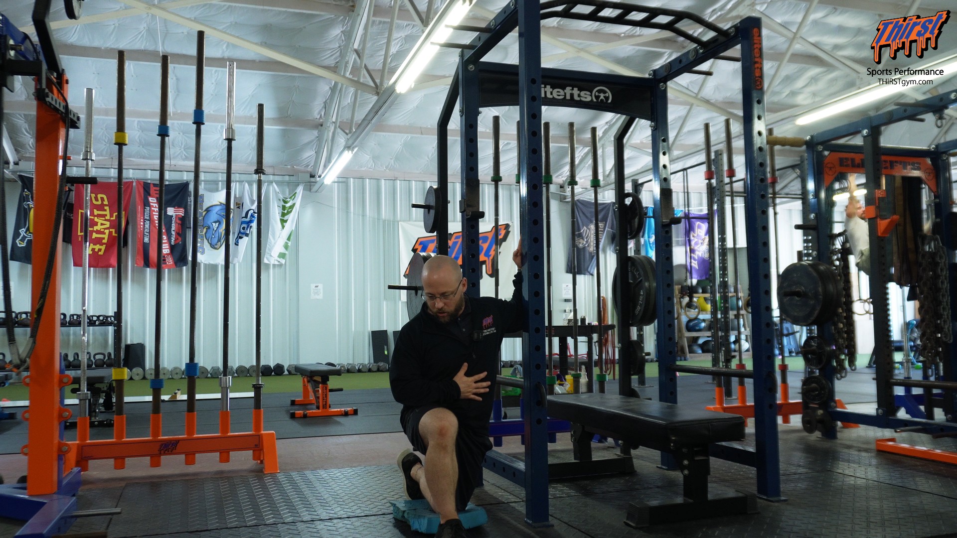 Half Kneeling Rack Pec Stretch