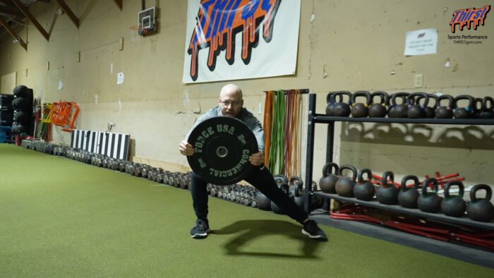 Lateral Lunge With Plate Reach